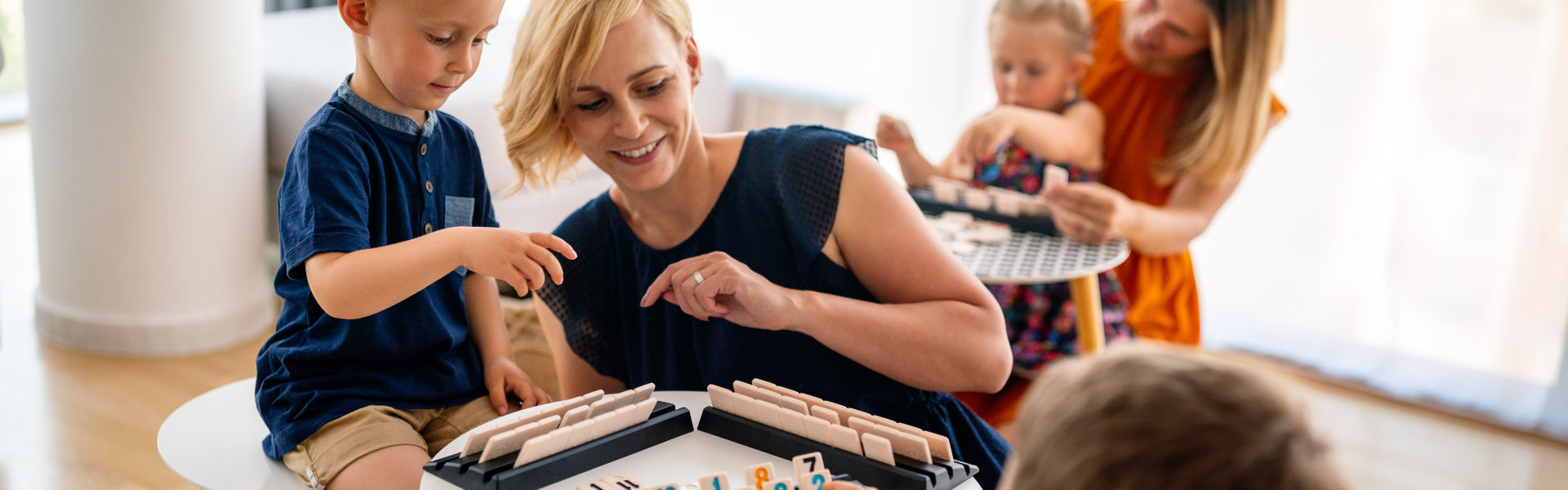 An educator with a child in day care.